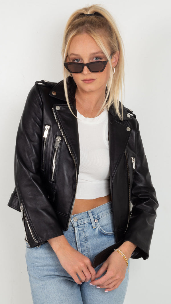 leather jacket with zippers in the front and on arms black