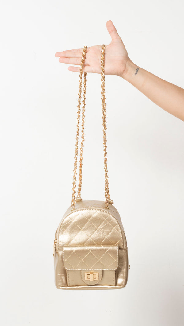van-de-vort-quilted-mini-backpack-gold